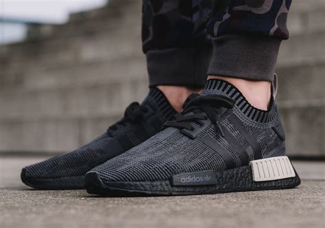 nmd r1 black primeknit